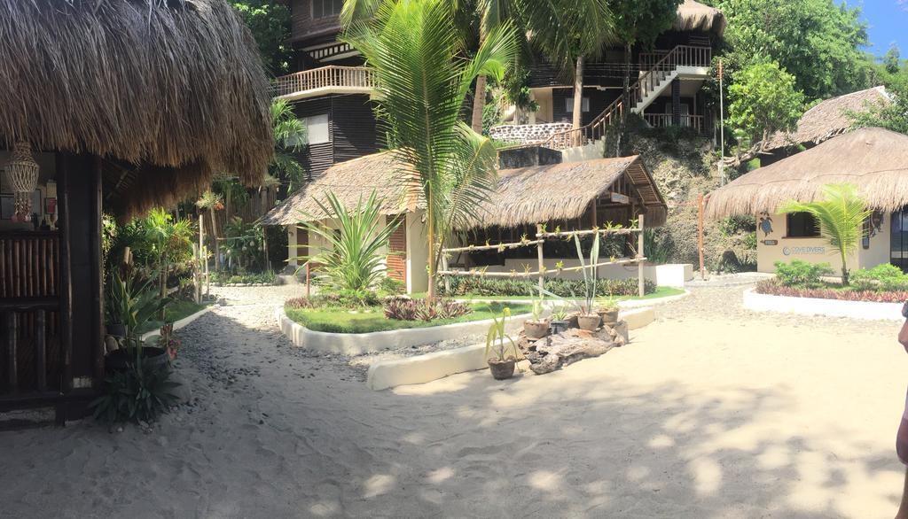 Cove Paradise Beach And Dive Resort Siaton Exterior photo